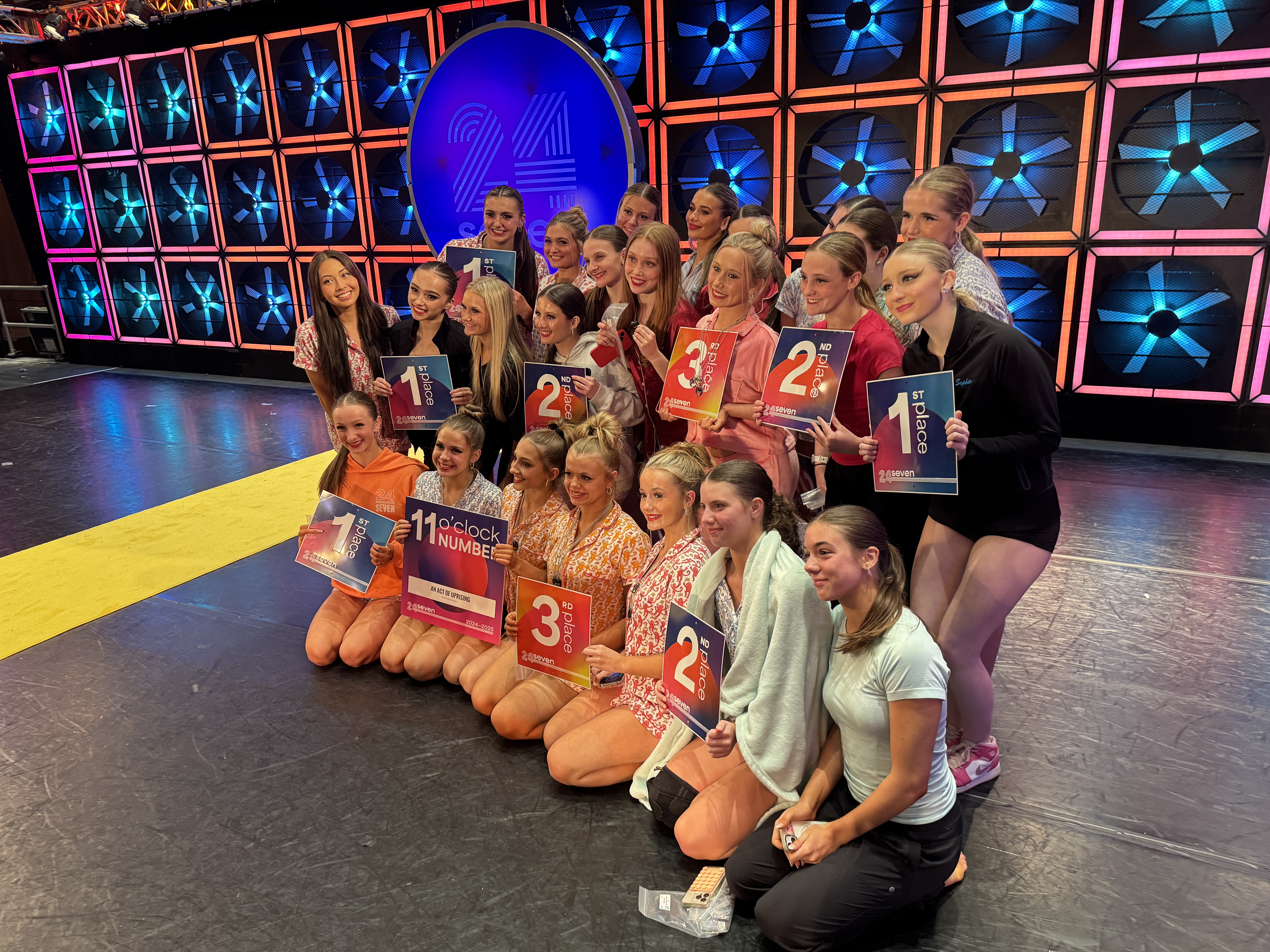 Company seniors celebrating at competition